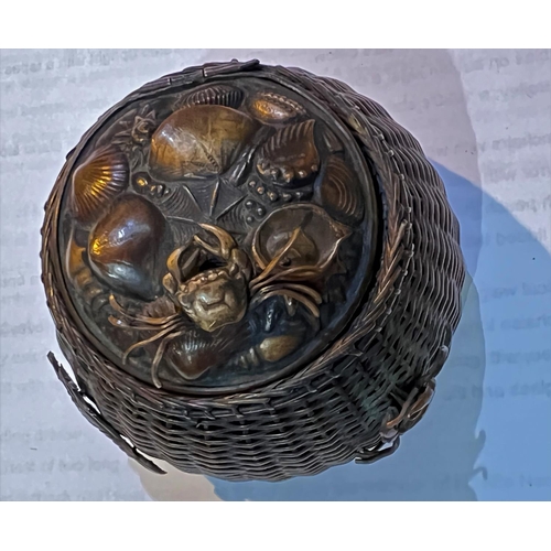 448A - A Japanese copper ink well in the form of a fisherman's basket with various creatures in relief, gla... 