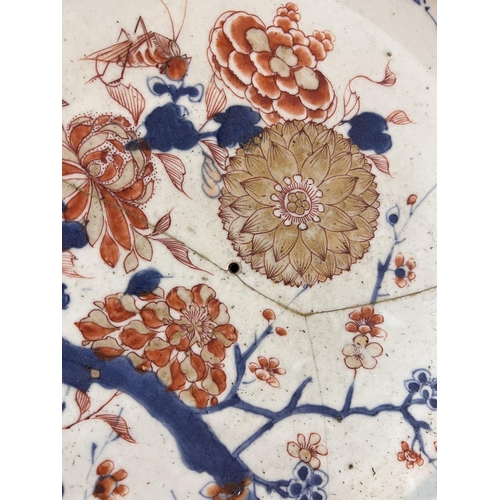 510A - An 18th/19th century Chinese Imari pattern charger, decorated with flowers etc. (restored)