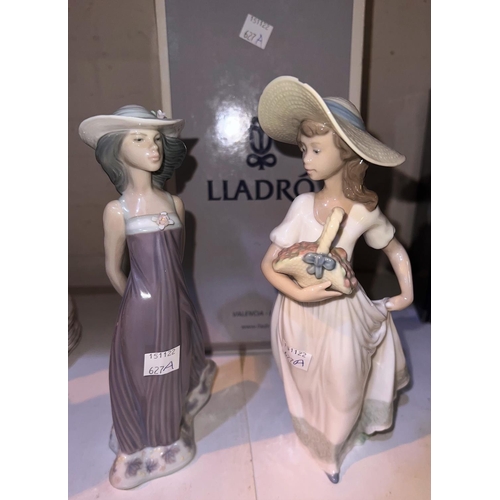 627A - A boxed figure of a young girl by Lladro No 5644; a similar Nao figure and other figures