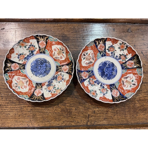 631 - Two Japanese Imari pattern scalloped edge dishes and a selection of glassware