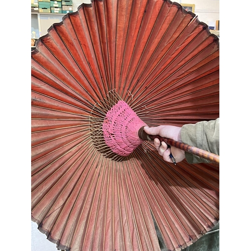 520A - A vintage Asian wood and cloth sunshade/umbrella 