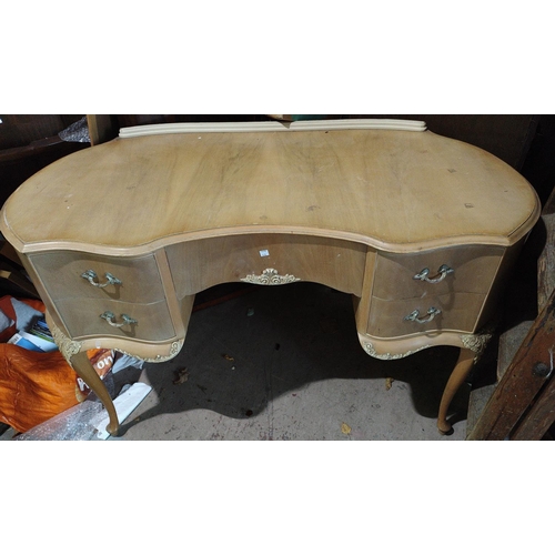 995A - A Olympia french style kidney shaped dressing table