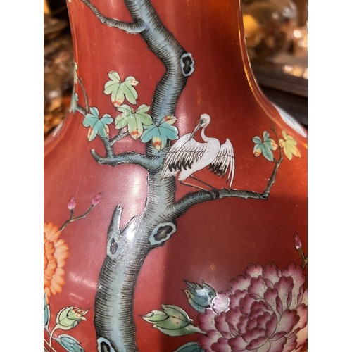 491 - A Chinese large red glazed vase decorated with polychrome chrysanthemums, birds, etc, with seal mark... 