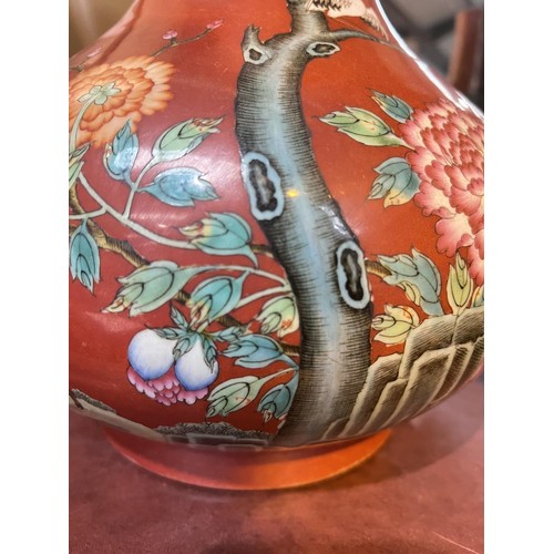 491 - A Chinese large red glazed vase decorated with polychrome chrysanthemums, birds, etc, with seal mark... 