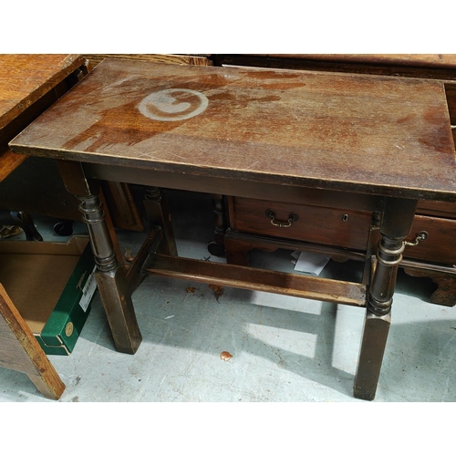 999A - An oak trestle occasional table, a book rack and a stool