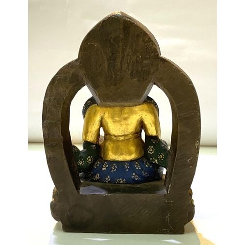 187 - A Chinese bronze buddha figure with gilt/coloured highlights and animal decoration, height 20cm