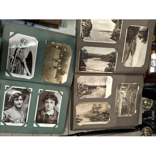264 - A 1920's postcard album, 150 plus cards; another part filled album