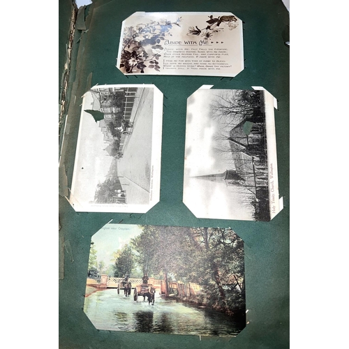 266 - An Edwardian postcard album, 140 plus cards