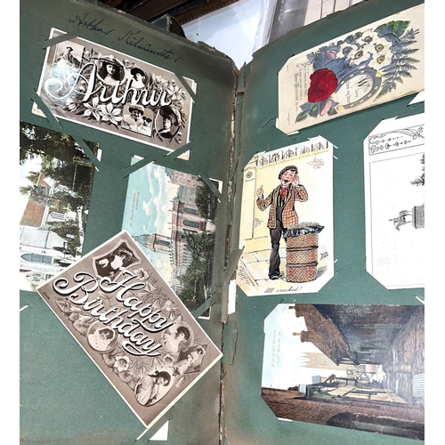 266 - An Edwardian postcard album, 140 plus cards