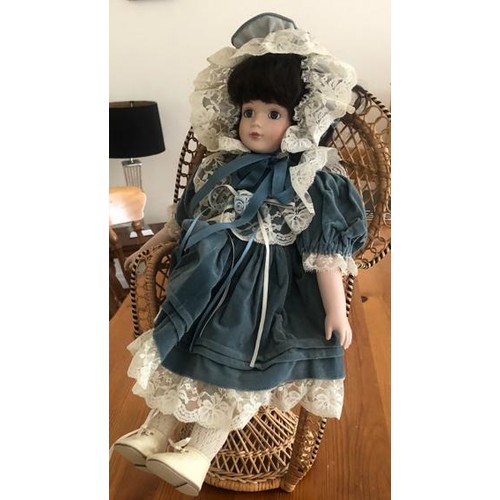 25 - A collection of 10 modern china head dolls in Victorian dress