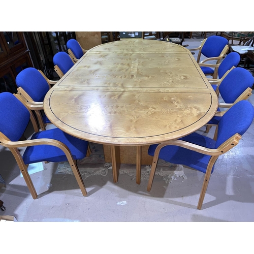 953 - A modern figured ash dining/boardroom suite comprising extending circular dining table and 8 dining ... 