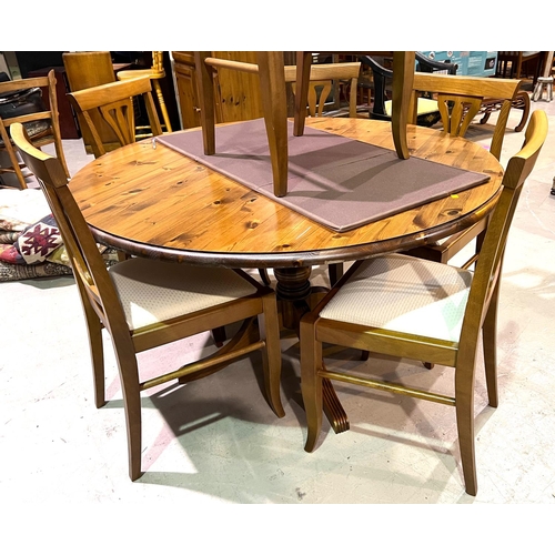 946 - A modern circular pedestal pine dining table and 6 chairs