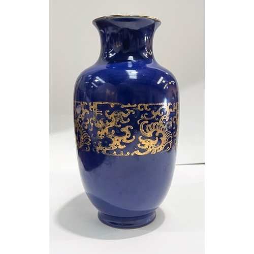 438A - A Chinese blue ground vase with gilt central patination and gilt rim, mark to base illegible, height... 