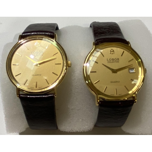 698 - A ladies Sekonda wristwatch with quartz movement, boxed; a pair of Lobor quartz dress watches, boxed