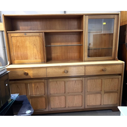 928 - A mid 20th century teak high back sideboard with 3 drawers and cupboards below, fall front cocktail ... 