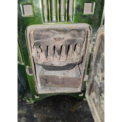 97C - An Art Deco style log burning stove with single door, in green enamel by Antinea, height 62cm, width... 