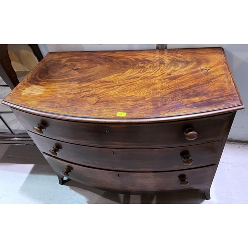 1019 - A Georgian mahogany bow front chest of three long drawers, inlaid around bracket feet length 112 x h... 