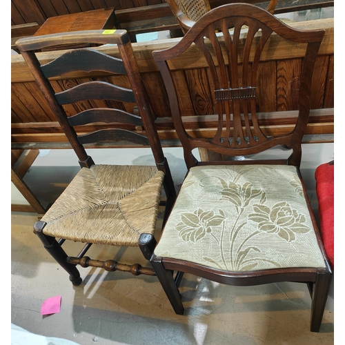 1029 - A country made ladder back rush seat chair and two mahogany Chippendale style dining chairs with flo... 