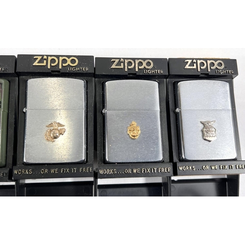 110 - Six military Zippo lighters four with American relief emblems for US Navy, Airforce, Naval Admiralty... 