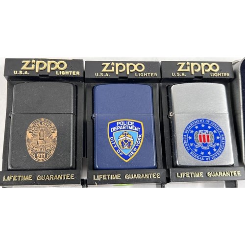 111 - Three American Police Department Zippo lighters in matt finish, two New York, 1 Los Angeles, an FBI ... 