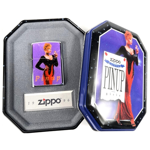 153 - Two Zippo lighters:  The Varga Girl, in tin; 1996 Pinup Girls, collectable of the year, origina... 