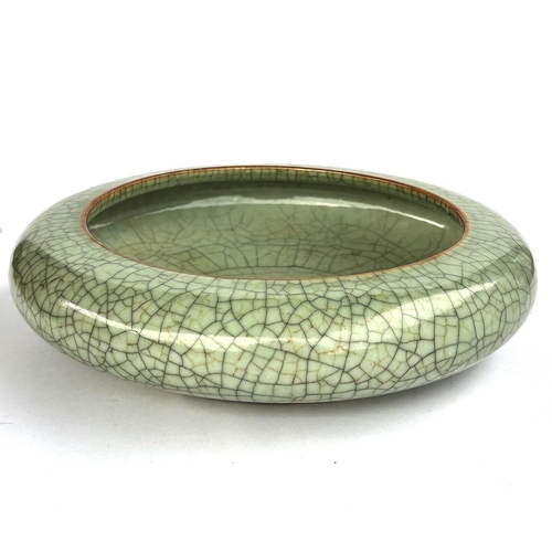 362 - A Chinese crackle glaze celadon bowl with inverted rim, four character mark to base, diameter 25cm