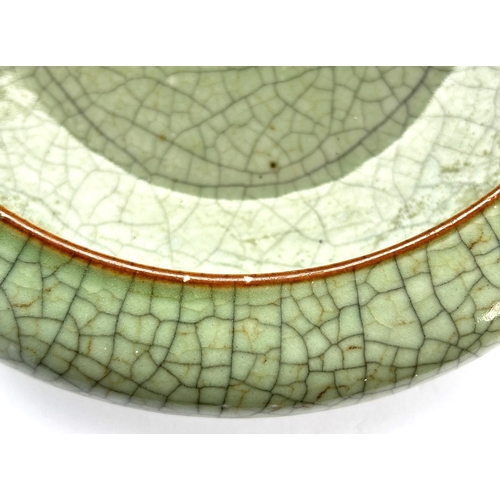 362 - A Chinese crackle glaze celadon bowl with inverted rim, four character mark to base, diameter 25cm