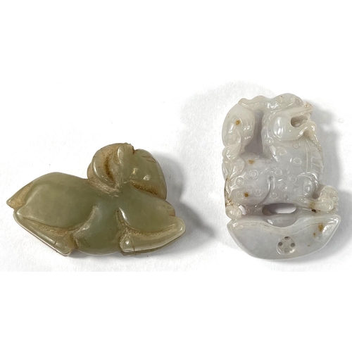 372 - Two Chinese jade coloured hard stone carved animals, one a ram lying down length 5.5, the other a do... 