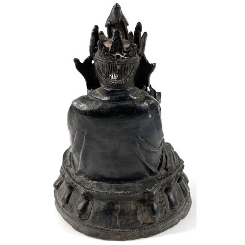 376 - A Chinese Ming period bronze of Guanyin seated with crossed legs, height 23cm