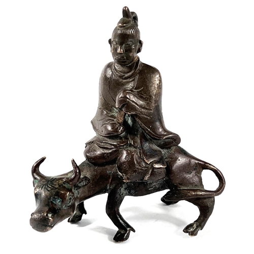 378 - A 19th century Chinese scholars scroll weight depicting man sat on ox length 7cm height 8cm