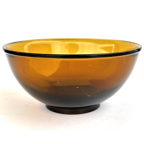 381 - A Chinese amber coloured glass bowl with Quin long mark etched into base, diameter 16cm