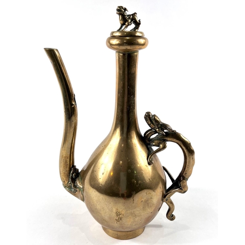 386 - A late 19th/early 19th Chinese polished bronze ewer with dragon handle and dog to lid of finial, hei... 