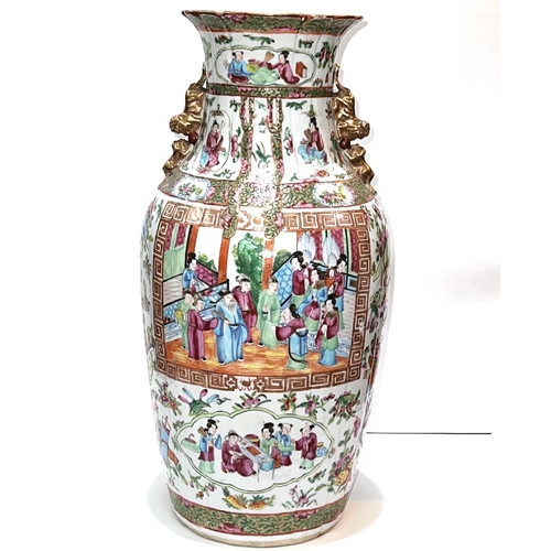 388 - A 19th century Chinese Canton vase depicting traditional scenes in various panels, slightly ribbed b... 