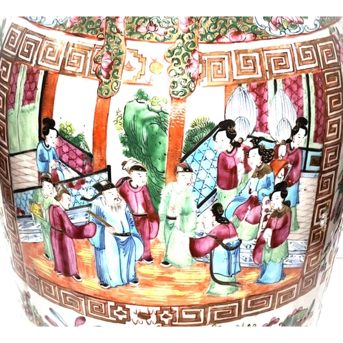 388 - A 19th century Chinese Canton vase depicting traditional scenes in various panels, slightly ribbed b... 