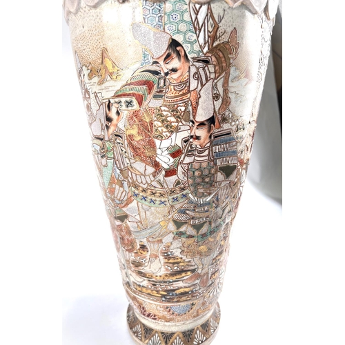 407 - A tall Japanese satsuma crackle glaze vase decorated with warriors in panels, gilt decoration with c... 