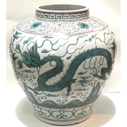 423 - A large Chinese globular shaped dragon vase with turquoise and red decoration, 6 character mark to b... 