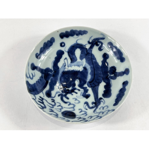 432 - A Chinese blue and white circular dish with mark to base, dia. 20cm