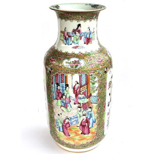 442 - A 19th Chinese Canton vase decorated with traditional scenes on panels to the back and front, cylind... 