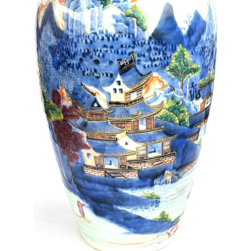 443 - An 18th century Chinese vase, with blue and polychrome village in mountain scene, with highly decora... 