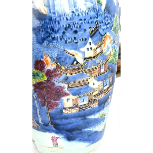 443 - An 18th century Chinese vase, with blue and polychrome village in mountain scene, with highly decora... 