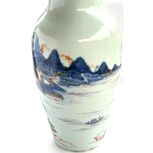 443 - An 18th century Chinese vase, with blue and polychrome village in mountain scene, with highly decora... 