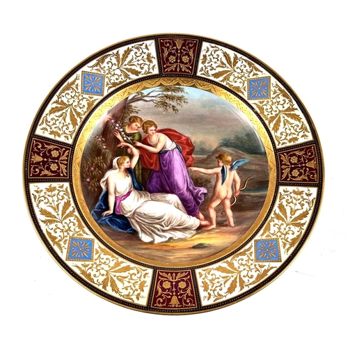 585 - A 19th century Vienna porcelain cabinet dish 'Aglaia bound by Cupid' hand painted with gilt decorati... 