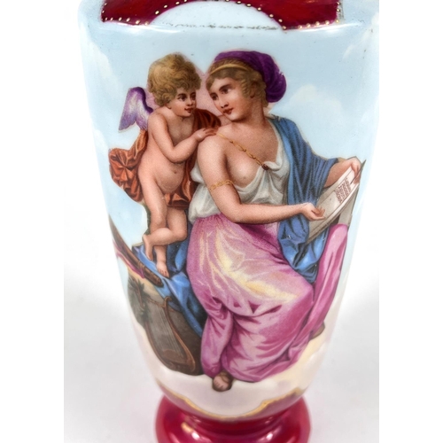 590 - A Vienna style vase with double hoop handles decorated with semi-clad females with cherub against a ... 