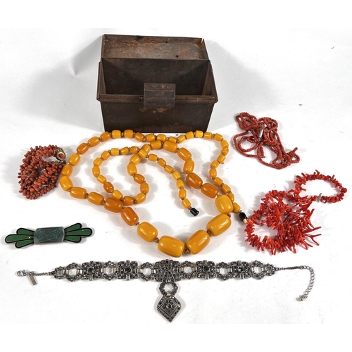 604 - A bakelite amber bead necklace; 2 coral necklaces; etc.