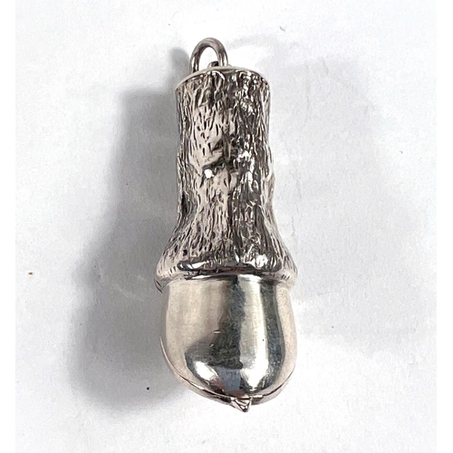 648 - A novelty silver vesta case in the form of a horse's hoof with opening shoe, stamped 925 'LT', overa... 