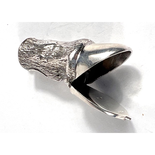 648 - A novelty silver vesta case in the form of a horse's hoof with opening shoe, stamped 925 'LT', overa... 