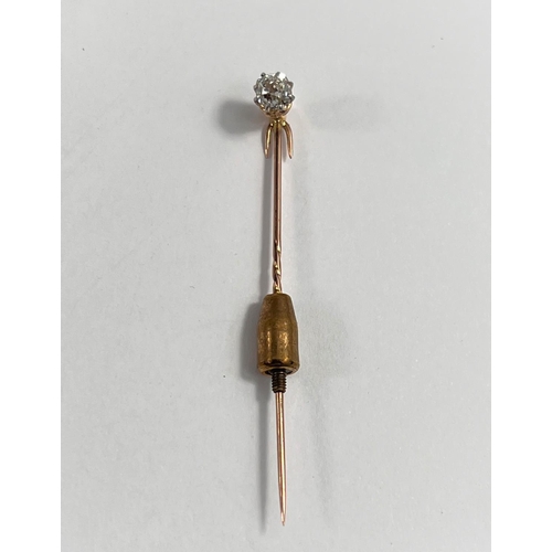 671 - A yellow metal stick pin set old cut diamond, approx diameter 5mm