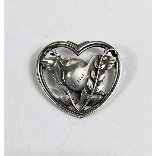 723 - Georg Jensen:  a pierced heart shaped brooch with bird amongst foliage, numbered 239, stamped S... 