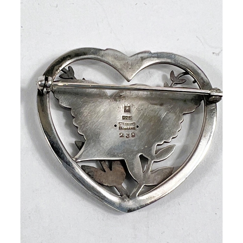 723 - Georg Jensen:  a pierced heart shaped brooch with bird amongst foliage, numbered 239, stamped S... 