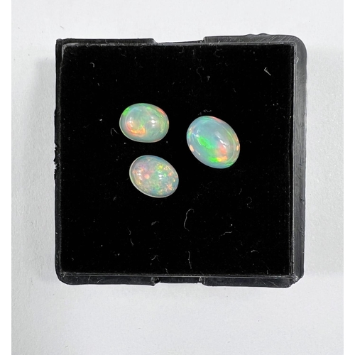 729 - 3 oval cabochon cut opals 3.72 carats in total